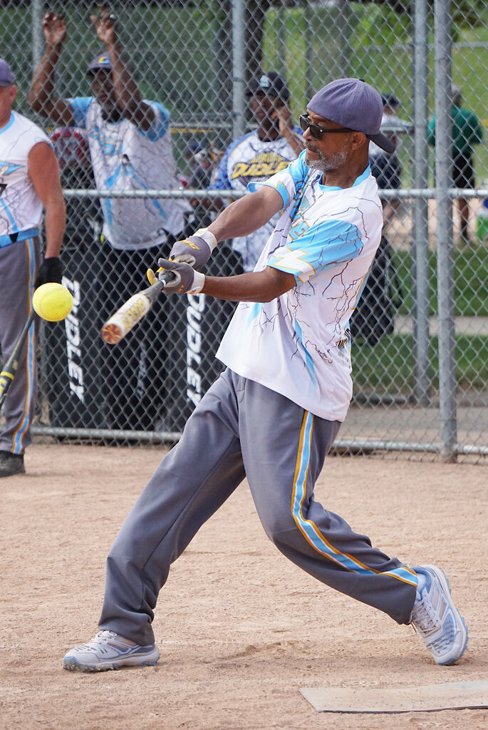Jolease Marshall swings and gets on base
